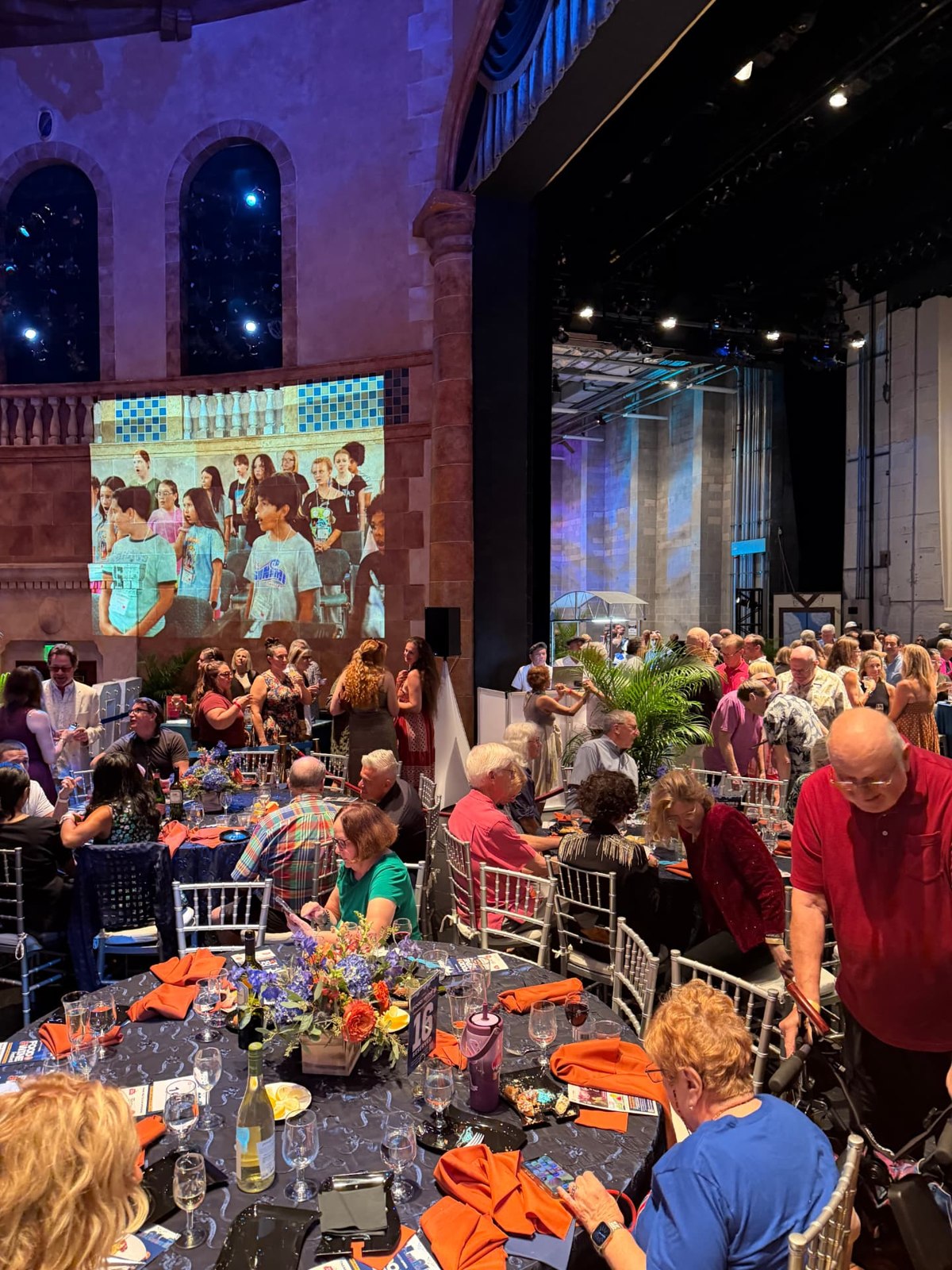 Community supporters enjoy the Sarasota Youth Opera fundraiser on the Sarasota Opera House stage